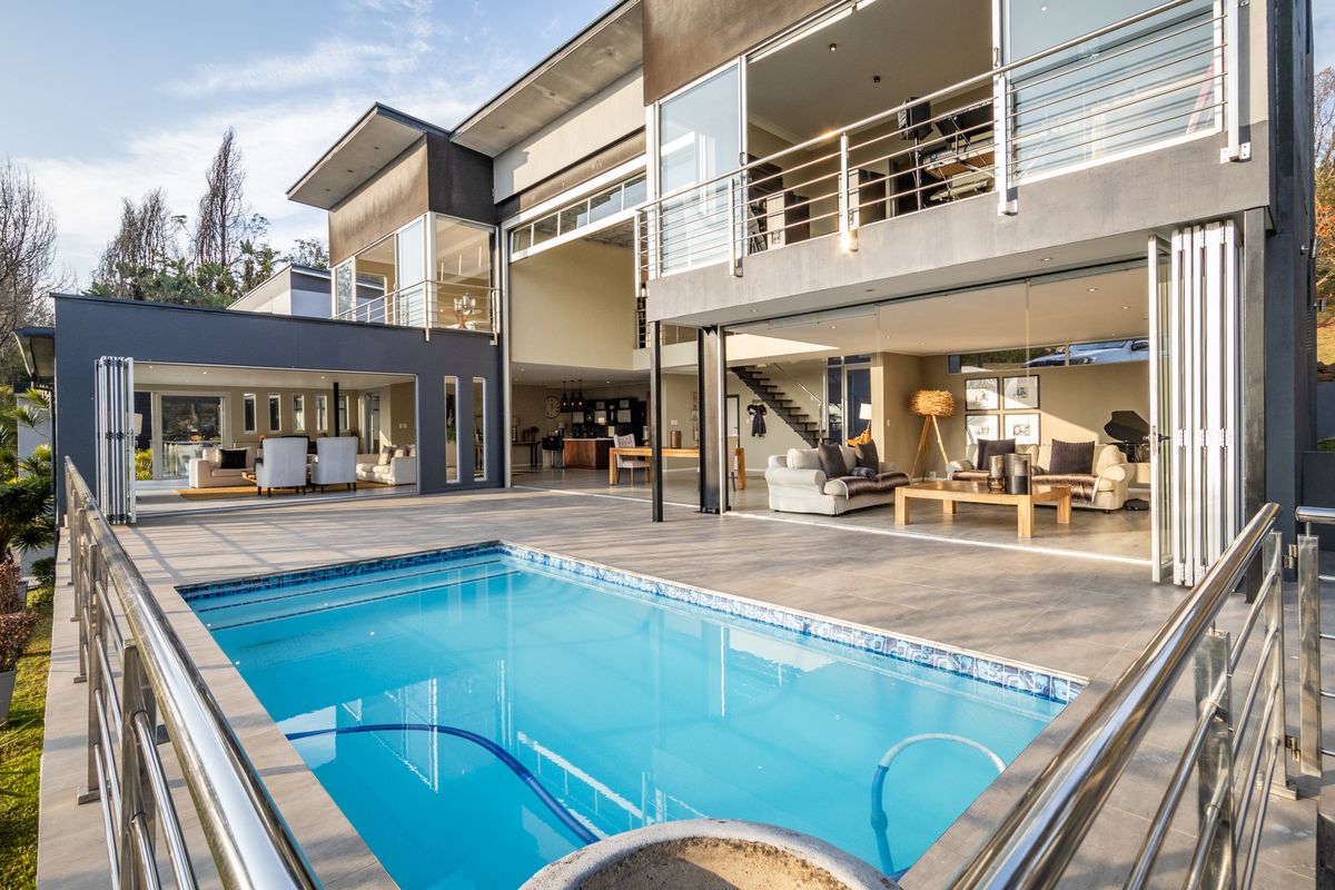Modern home with a pool and open-plan living area